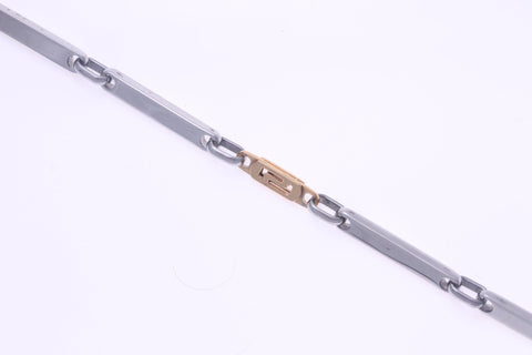 Stainless Steel Thin Link Bracelet With Center Rose Gold Link Of Greek Key Design